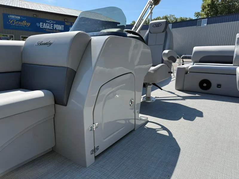 Slide: The Image of 2026 Bentley Pontoons Legacy 243 Swingback Dual Capt. interior with sleek seating and modern design. - 14