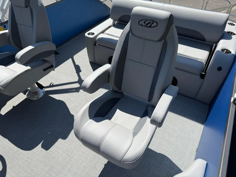 Slide: The Image of 2026 Bentley Pontoons Legacy 243 Swingback Dual Capt. interior with luxurious seating. - 17