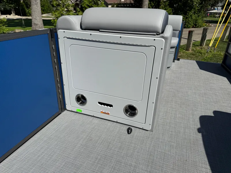 Slide: The Image of 2026 Bentley Pontoons Legacy 243 Swingback interior with gray seating and blue paneling. - 20