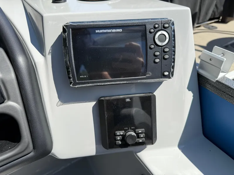 Slide: The Image of Control panel of 2026 Bentley Pontoons Legacy 243 with Humminbird and JBL systems. - 26