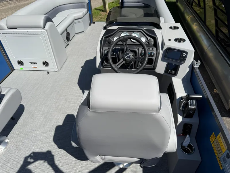 Slide: The Image of 2026 Bentley Pontoons Legacy 243 Swingback Dual Capt. interior with modern helm and seating. - 31