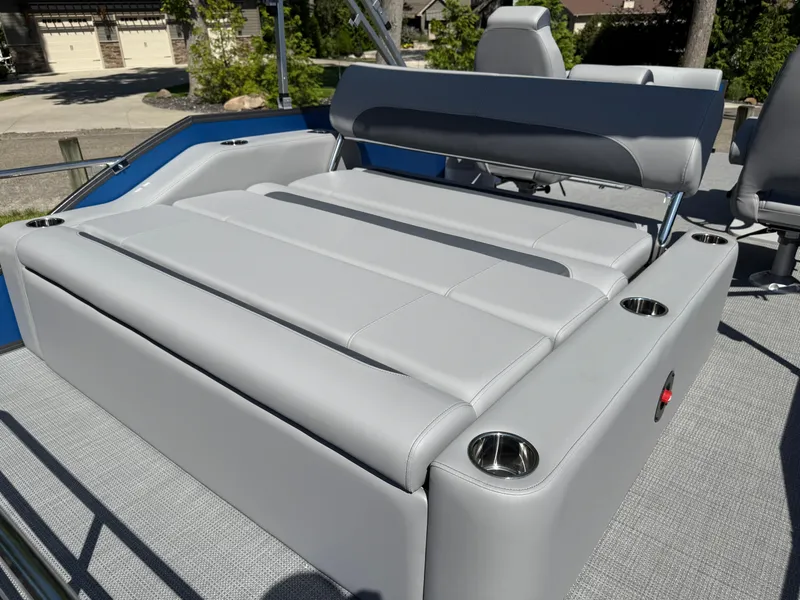 Slide: The Image of 2026 Bentley Pontoons Legacy 243 Swingback Dual Capt. with luxurious gray seating and cup holders. - 34