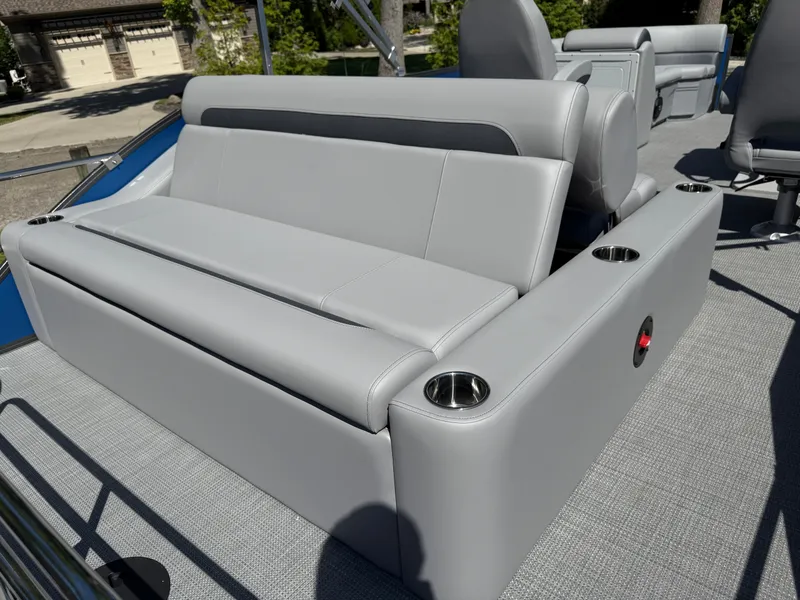Slide: The Image of 2026 Bentley Pontoons Legacy 243 Swingback Dual Capt. with sleek gray seating and cup holders. - 35