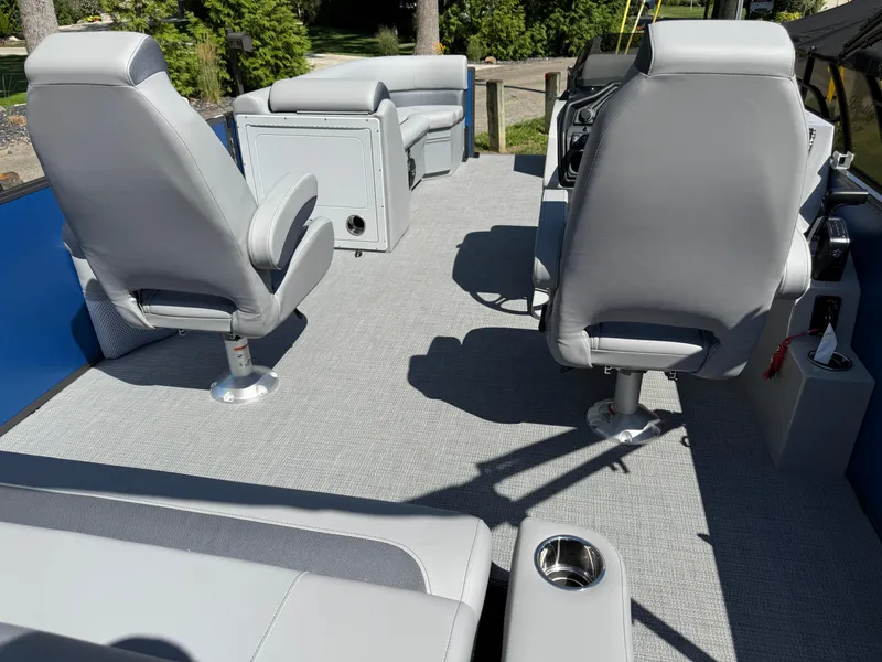 Slide: The Image of 2026 Bentley Pontoons Legacy 243 interior with dual captain seats and modern design. - 38