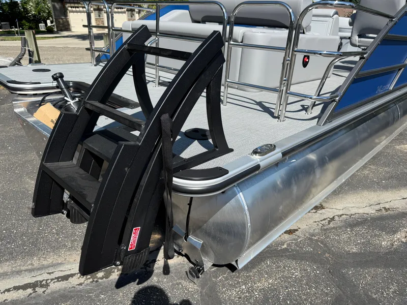 Slide: The Image of 2026 Bentley Pontoons Legacy 243 Swingback Dual Capt. with black boarding ladder. - 6