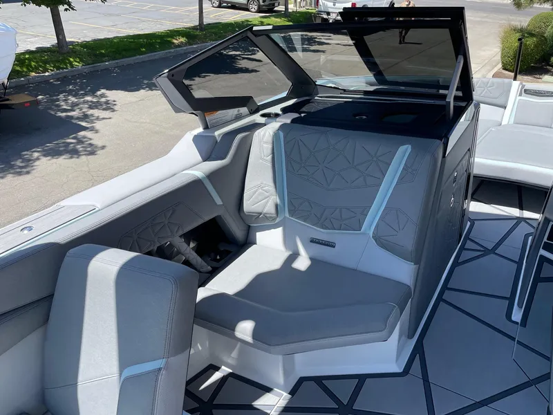 Slide: The Image of 2025 Nautique Super Air Nautique G25 Paragon interior with modern seating and sleek design. - 10