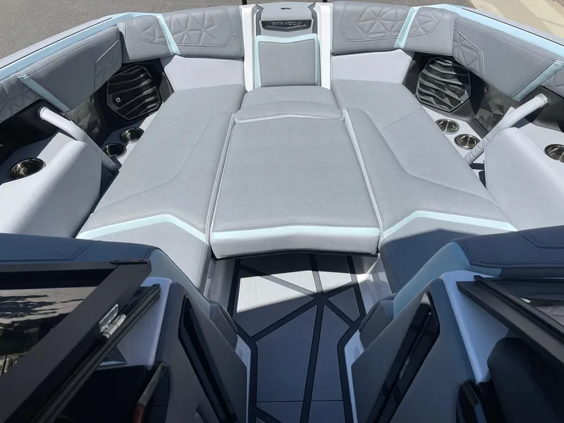 Slide: The Image of 2025 Nautique Super Air Nautique G25 Paragon interior with luxurious seating and modern design. - 11