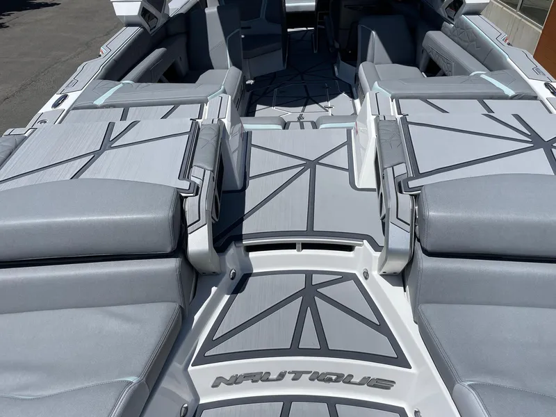 Slide: The Image of 2025 Nautique Super Air Nautique G25 Paragon interior with sleek, modern seating design. - 4