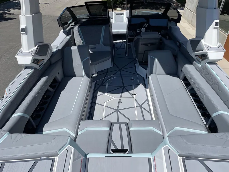 Slide: The Image of 2025 Nautique Super Air Nautique G25 Paragon interior with luxurious seating and modern design. - 5