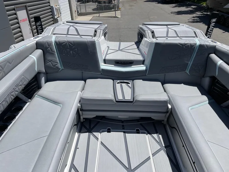 Slide: The Image of 2025 Nautique Super Air Nautique G25 Paragon interior with luxurious seating and modern design. - 8