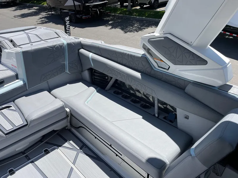 Slide: The Image of 2025 Nautique Super Air Nautique G25 Paragon interior with luxurious seating and modern design. - 9