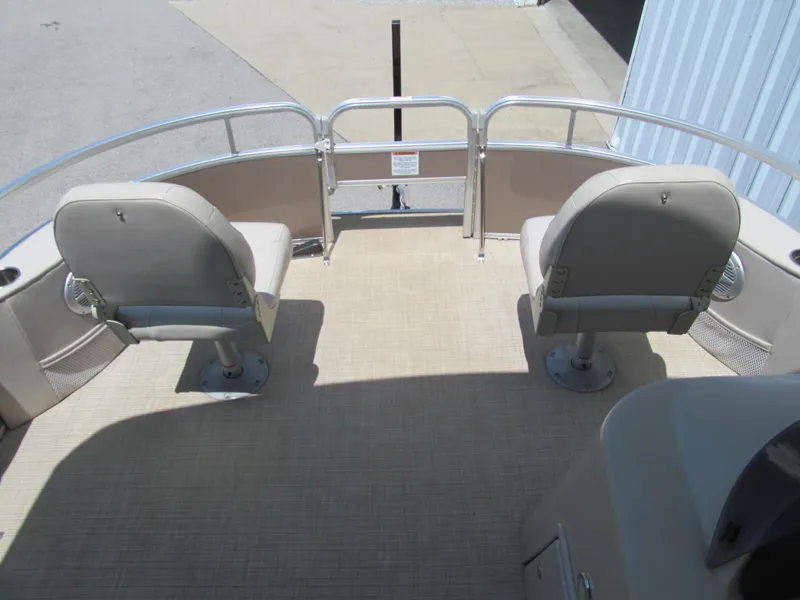 Slide: The Image of 2018 Berkshire 17A CTS pontoon boat interior with two swivel seats and railing. - 7