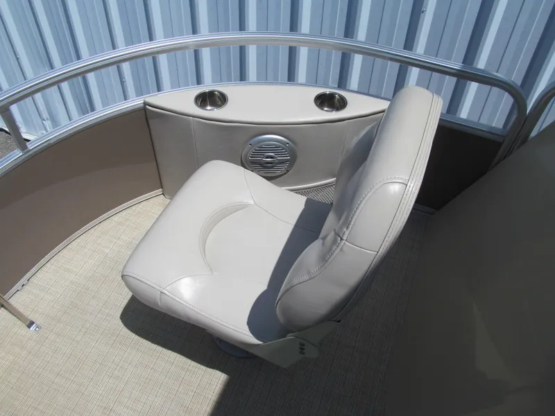 Slide: The Image of Captain's chair on 2018 Berkshire 17A CTS boat with cup holders and speaker. - 9