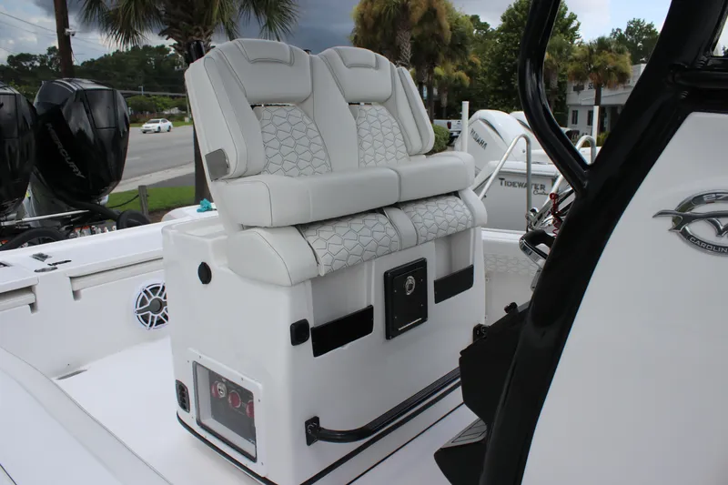 Slide: The Image of 2026 Tidewater 2700 Carolina Bay boat with luxurious seating and modern design. - 33