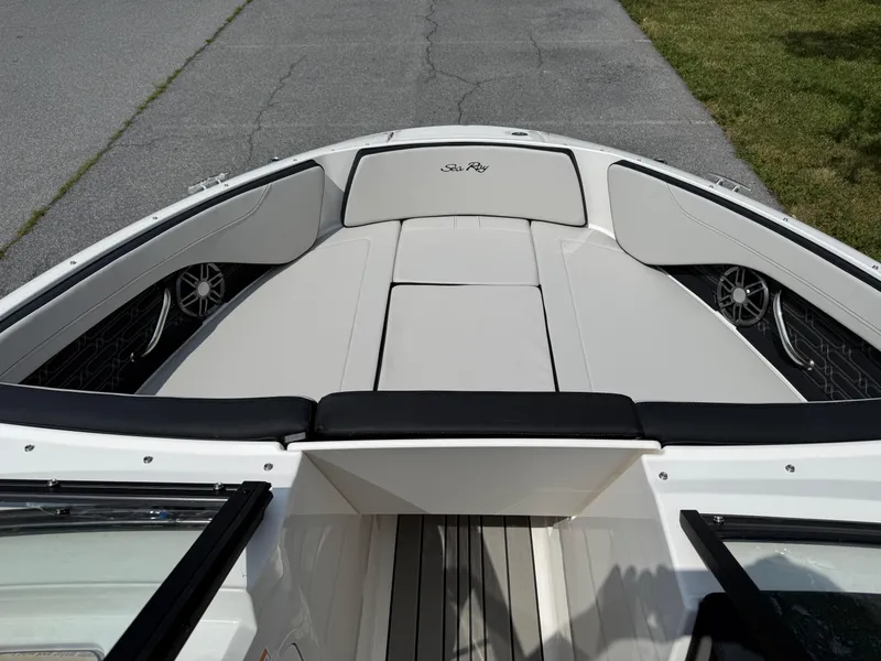 Slide: The Image of 2026 Sea Ray SPX 210 Outboard boat interior with sleek seating and modern design. - 12