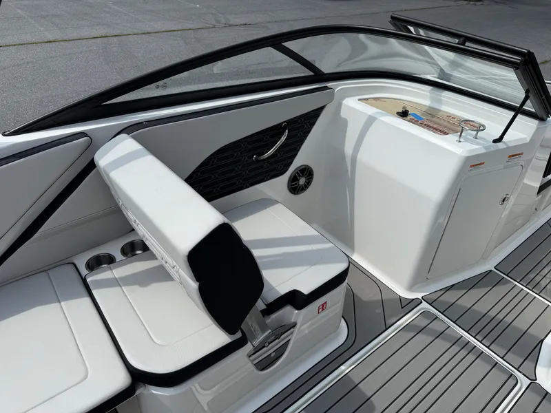 Slide: The Image of 2026 Sea Ray SPX 210 Outboard interior with sleek seating and modern design. - 8