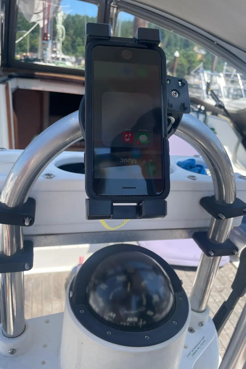 Slide: The Image of Smartphone mounted on Jeanneau Sun Odyssey 36 yacht's steering wheel, 1990 model. - 10