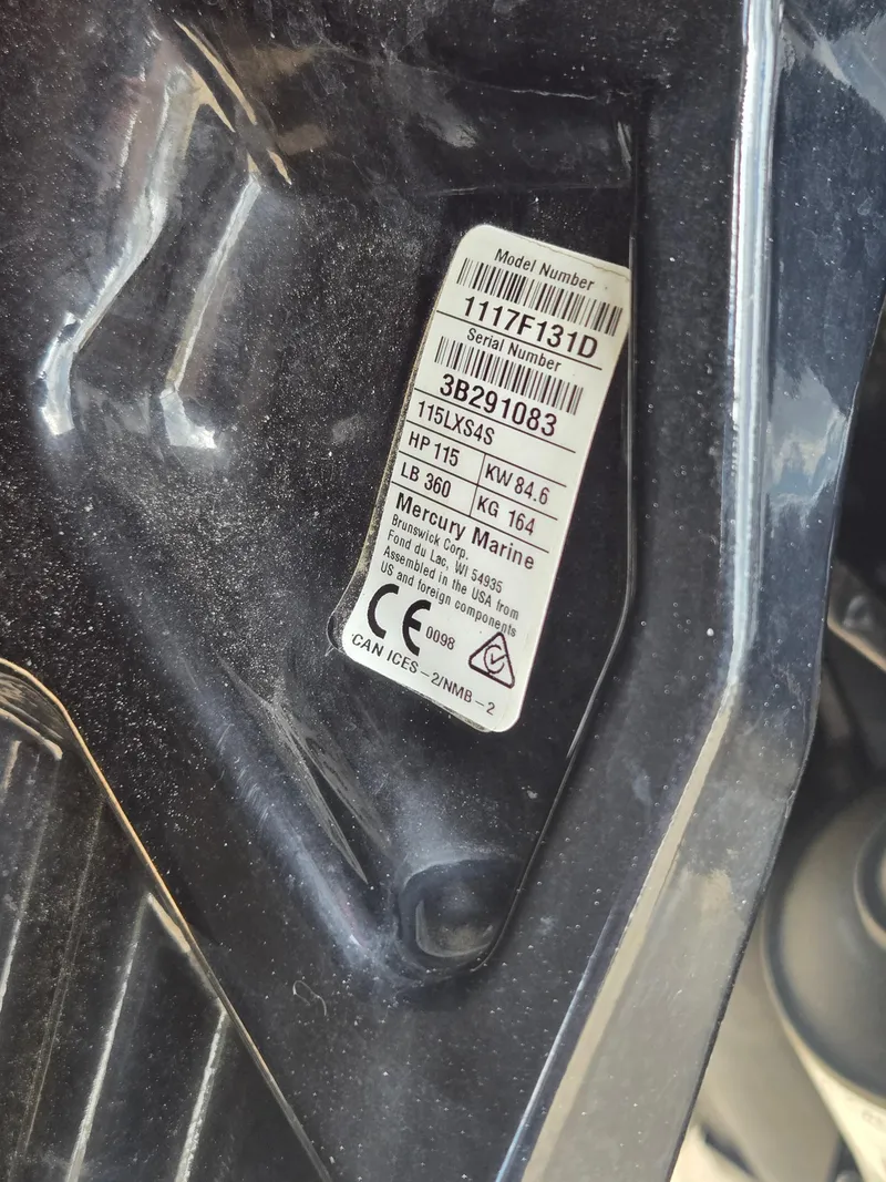 Slide: The Image of Label on 2019 Tracker Pro Team 190 TX Tournament Edition boat engine. - 11