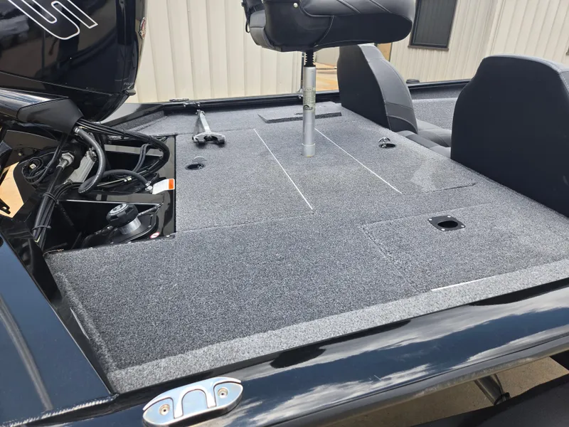 Slide: The Image of 2019 Tracker Pro Team 190 TX Tournament Edition boat deck with seating and motor. - 14