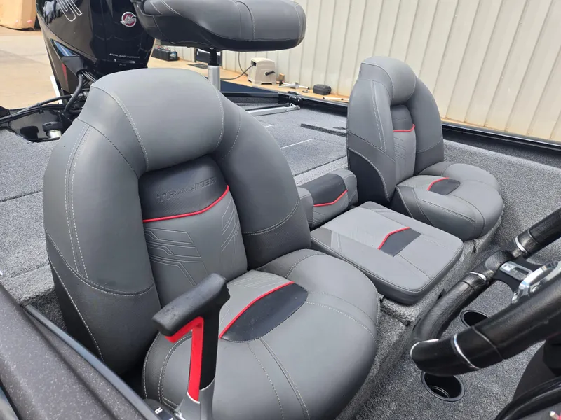 Slide: The Image of 2019 Tracker Pro Team 190 TX Tournament Edition boat seats, gray with red accents. - 7
