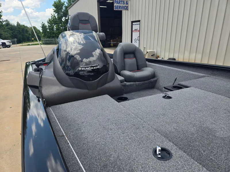 Slide: The Image of 2019 Tracker Pro Team 190 TX Tournament Edition boat with dual seats and carpeted deck. - 9