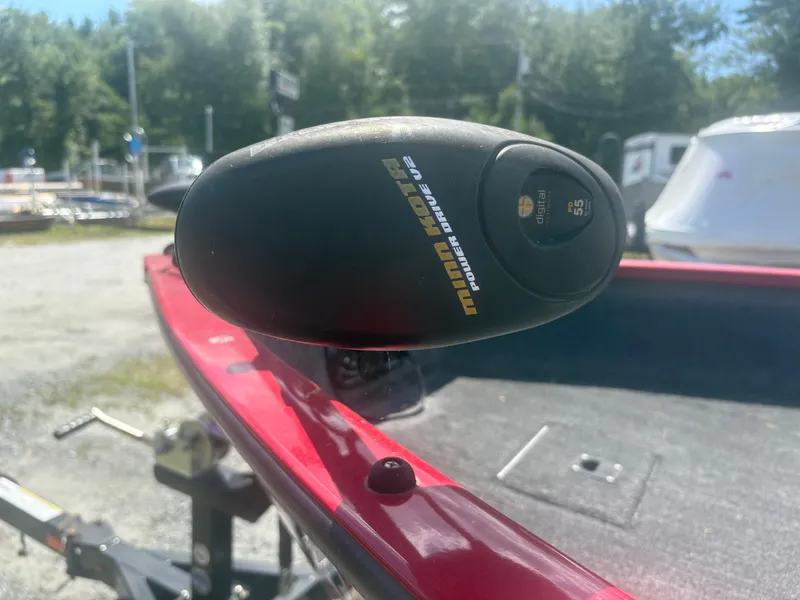 Slide: The Image of 2016 Tracker Pro Guide V-175 SC with Minn Kota PowerDrive motor, parked outdoors. - 3