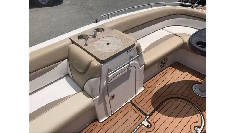 Slide: The Image of 2019 Starcraft MDX 191 O/B boat interior with seating and cup holders. - 8