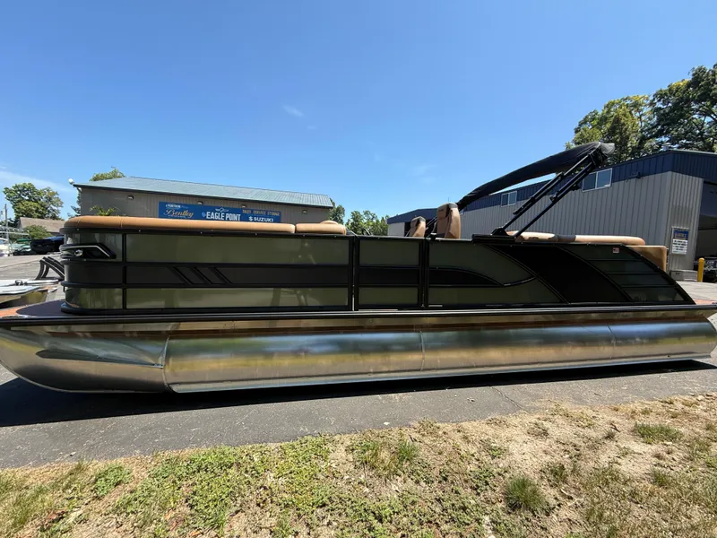 The Image of 2026 Bentley Pontoons Elite 253 Admiral pontoon boat on display outdoors. - 0