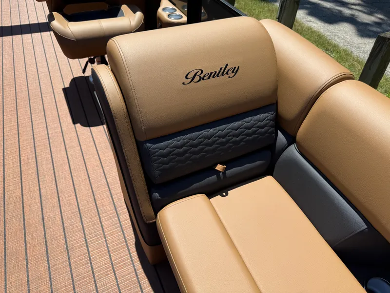 Slide: The Image of Luxurious seating on 2026 Bentley Pontoons Elite 253 Admiral, featuring elegant tan upholstery. - 14
