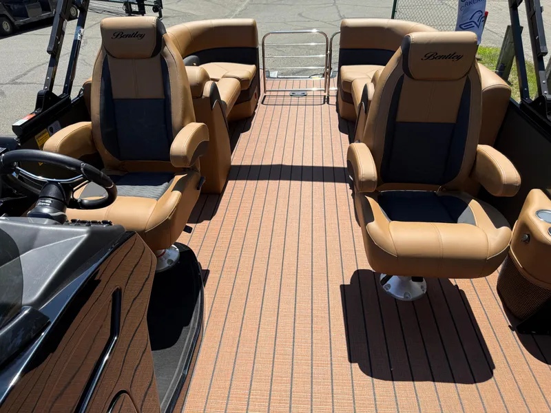 Slide: The Image of 2026 Bentley Pontoons Elite 253 Admiral interior with luxurious seating and sleek design. - 16