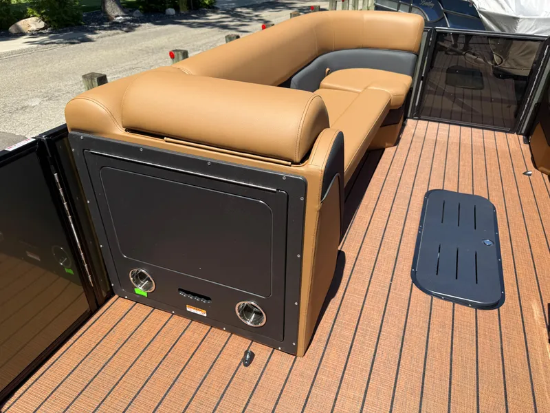 Slide: The Image of 2026 Bentley Pontoons Elite 253 Admiral with tan seating and sleek deck design. - 19