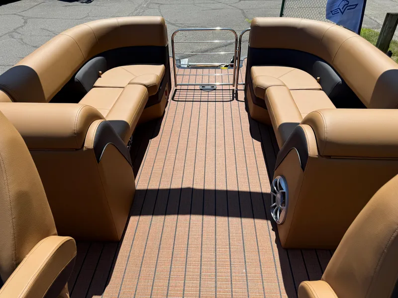 Slide: The Image of Luxurious interior of 2026 Bentley Pontoons Elite 253 Admiral with tan seating and sleek design. - 29