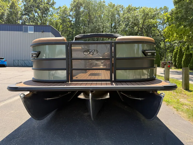 Slide: The Image of 2026 Bentley Pontoons Elite 253 Admiral pontoon boat, parked outdoors, showcasing sleek design and modern features. - 3