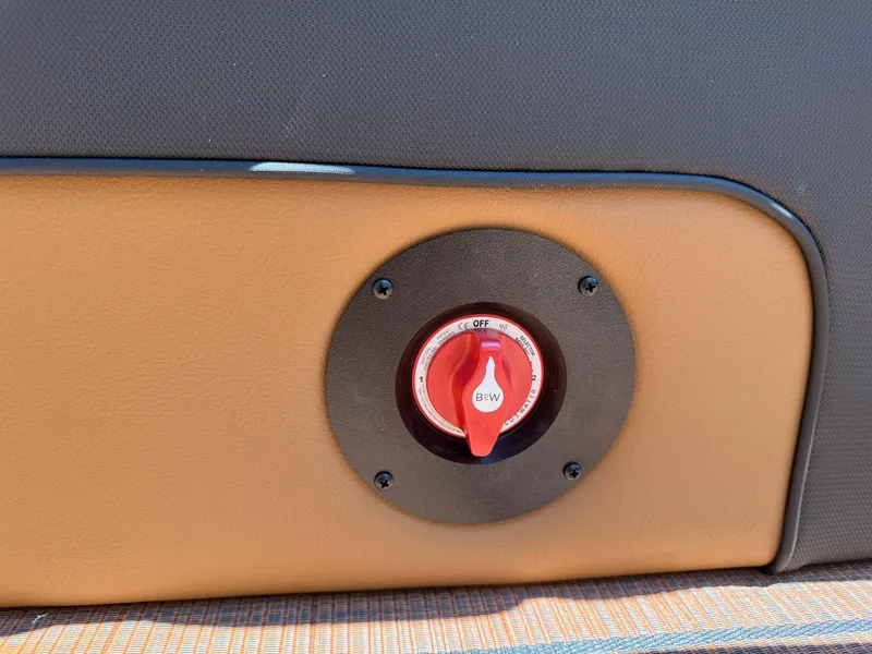 Slide: The Image of Red switch on Bentley Pontoons Elite 253 Admiral 2026, set against tan and gray panel. - 34