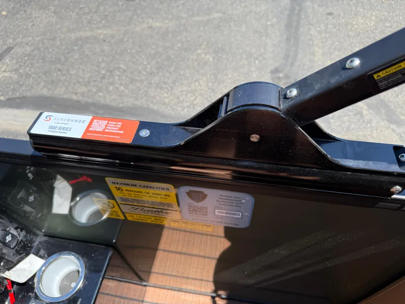 Slide: The Image of 2026 Bentley Pontoons Elite 253 Admiral with SureShade 1000 Series power shade. - 35