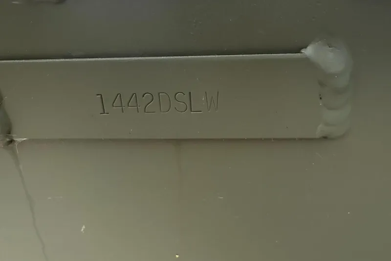 Slide: The Image of Close-up of Alweld 1442 MARSH JON DSLW 2025 model number engraving. - 10