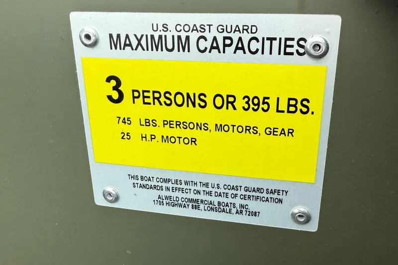 Slide: The Image of 2025 Alweld 1442 Marsh Jon DSLW boat capacity label, 3 persons or 395 lbs limit. - 5