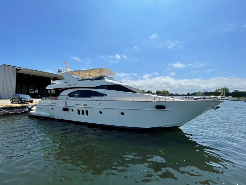 The Image of Luxury 2004 Azimut 74 yacht docked on a sunny day. - 0