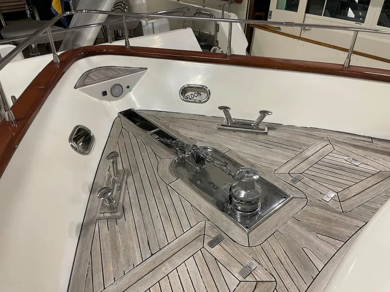 Slide: The Image of Deck of 2004 Azimut 74 yacht with polished wood and metal fittings. - 32