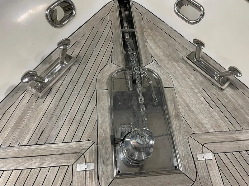 Slide: The Image of Anchor chain and cleats on 2004 Azimut 74 yacht deck. - 34