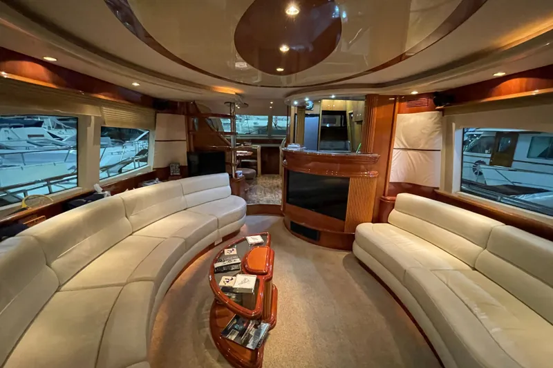Slide: The Image of Luxurious interior of a 2004 Azimut 74 yacht with elegant seating and modern design. - 48
