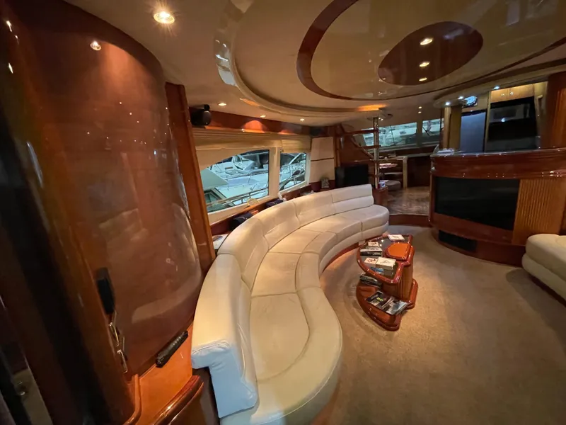 Slide: The Image of Luxurious interior of a 2004 Azimut 74 yacht with elegant seating and modern design. - 49