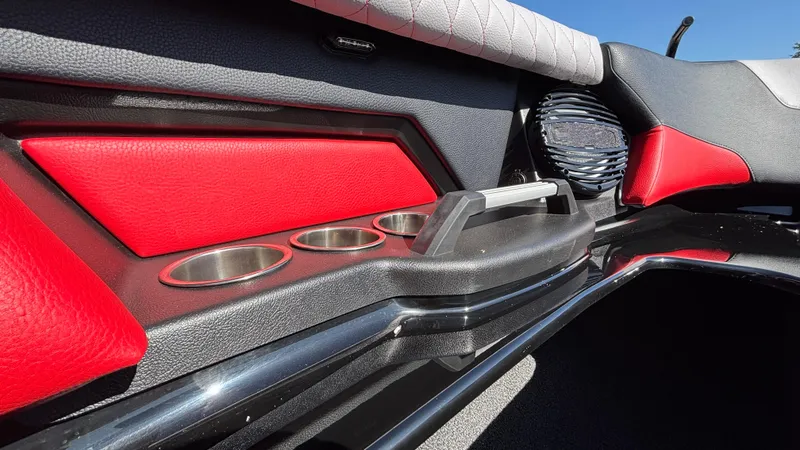 Slide: The Image of 2026 Tigé Z5 interior with red accents, cup holders, and speaker detail. - 22