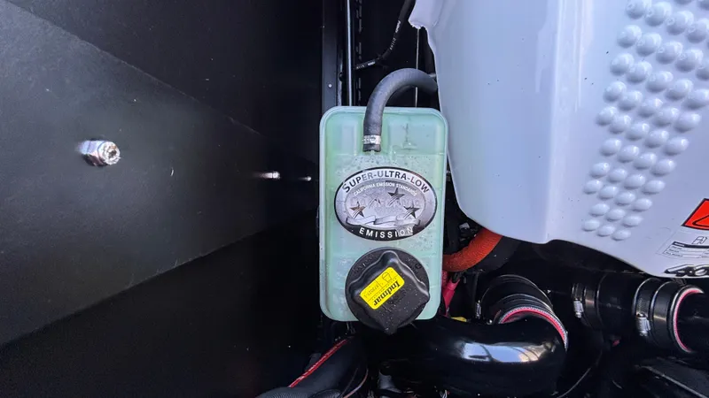 Slide: The Image of Engine compartment of 2026 Tigé Z5 with super-ultra-low emission label. - 38