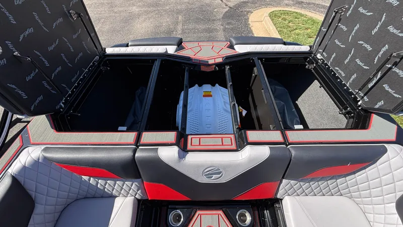 Slide: The Image of 2026 Tigé Z5 boat interior with open storage compartments and stylish seating. - 39