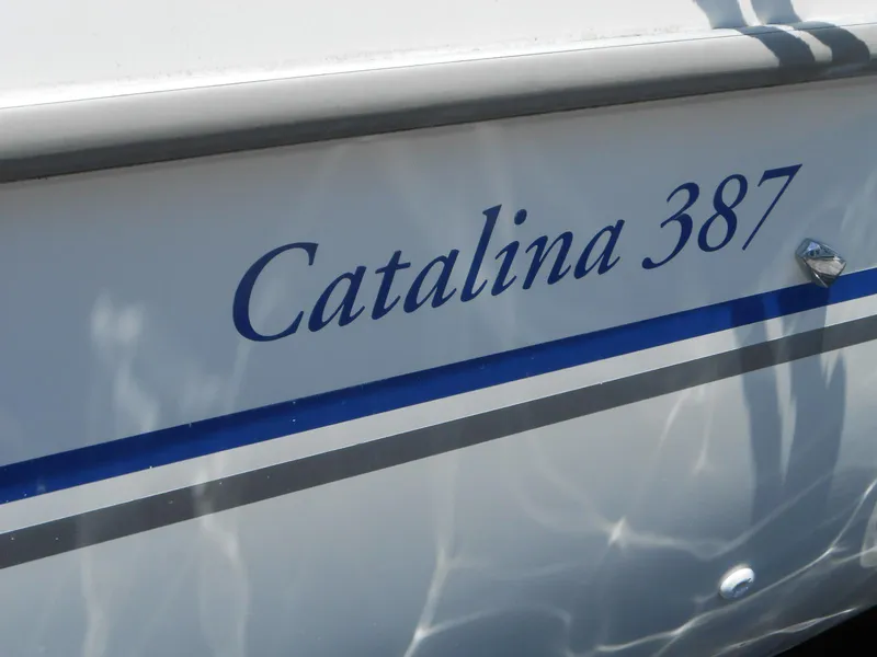 Slide: The Image of Catalina 387 sailboat, 2004 model, with blue lettering and stripe on hull. - 7