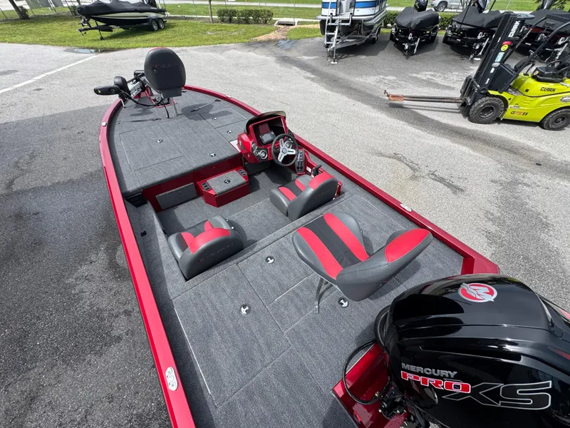 Slide: The Image of 2026 Vexus AVX1880 boat with Mercury Pro XS engine, red and gray interior. - 13