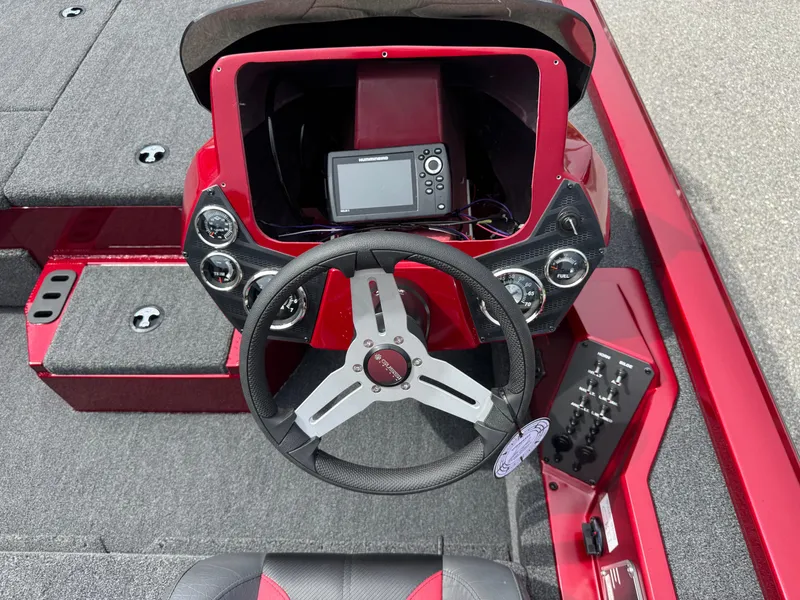 Slide: The Image of 2026 Vexus AVX1880 boat dashboard with steering wheel and electronic display. - 15