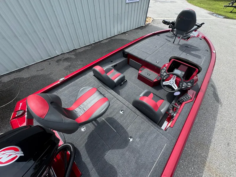 Slide: The Image of 2026 Vexus AVX1880 boat interior with red and gray seating, steering console, and spacious deck. - 17