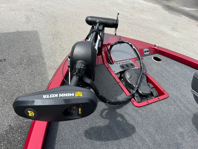 Slide: The Image of 2026 Vexus AVX1880 boat with Minn Kota trolling motor on deck. - 8